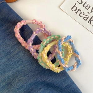 Detail of colorful braided hair ties set with durable elastic and frosted buckles