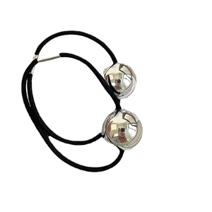 Minimalist elastic hair tie with polished silver beads and engraved brand detailing