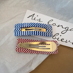 Checkered square acetate hair clips in red and blue with elegant gold metal base