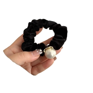 Elegant black velvet scrunchie with a large pearl pendant for women hair styling