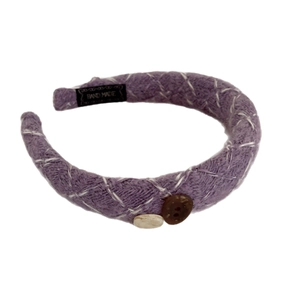 Vintage purple knitted headband with white stitching and decorative buttons for women