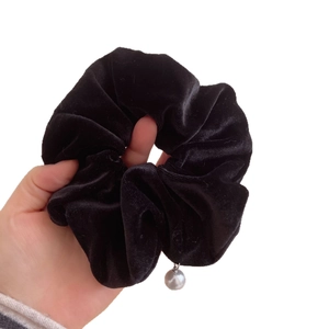 Elegant black velvet scrunchie hair tie with a silver pearl charm for women ponytail