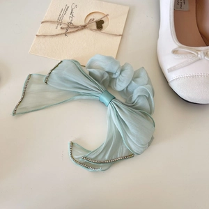 Elegant light blue organza bow scrunchie with rhinestones for a sophisticated look