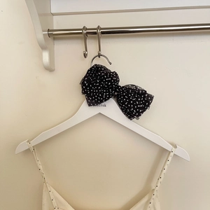 French style black and white polka dot mesh bow hair clip on white wooden hanger