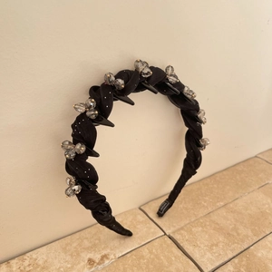Padded crystal headband with black twisted fabric and sparkling grey beads for volume