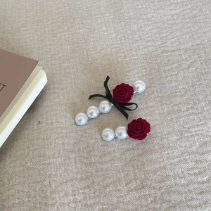 Vintage velvet rose and pearl hair clip set with elegant black ribbon bow accessory
