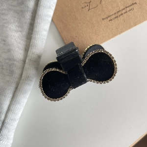 Elegant black velvet bow hair claw clip with crystal rhinestones for women
