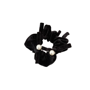 Elegant black velvet scrunchie with white pearl charms for hair accessory styling