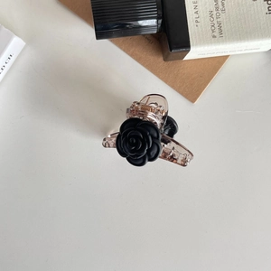 Elegante molletta per capelli a rosa nera con base champagne per look raffinati