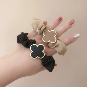Minimalist clover design elastic hair scrunchies in black and khaki fabric for women