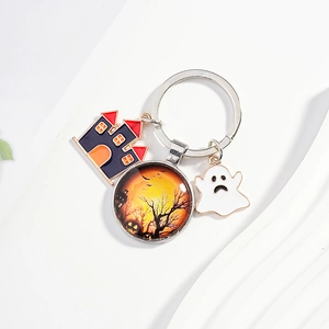 Halloween keychain with purple castle, ghost pendant and sunset tree glass cabochon