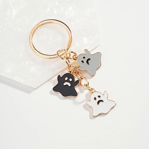 Cartoon ghost keychain set with black white and grey charms on gold stainless steel ring