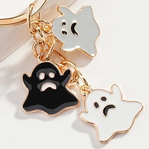 Ghost keychain set with black, white and grey enamel charms on gold stainless steel ring