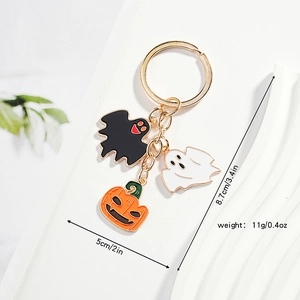 Detailed view of Halloween ghost and pumpkin charms with size and weight dimensions