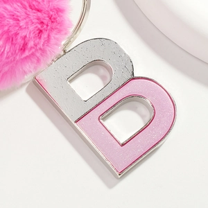 Stylish pink letter B keychain with fluffy fur pompom and silver metal frame for handbags