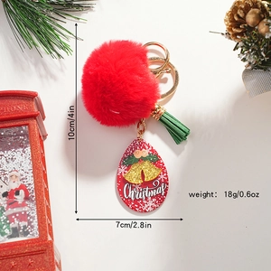 Cute red plush Christmas ball keychain with green tassel and gold bell charm for bags