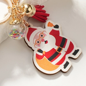 Christmas wooden Santa keychain with red tassel, glitter glass ball and gold bell charm