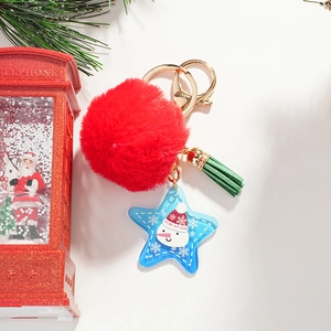 Christmas snowman keychain with red faux fur pompom, green tassel and blue star tag