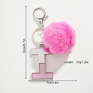 Porte-clés pompon rose avec lettre I à paillettes et informations sur la taille