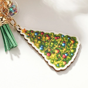 Christmas tree wooden keychain with green leather tassel and colorful sequin star charm