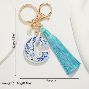 Blue porcelain letter C keychain with gold lobster clasp and blue tassel measurements