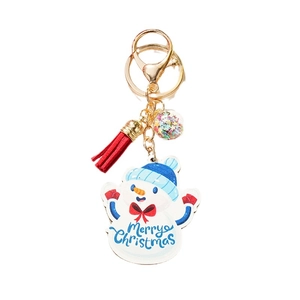 Blue snowman wooden keychain with Merry Christmas charm and red tassel pendant