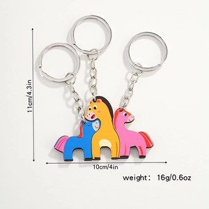 Detailed size view of colorful cartoon pony wood keychains showing 11cm height and 10cm width