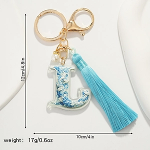 Detailed dimensions of letter L keychain with blue floral patterns and silk tassel
