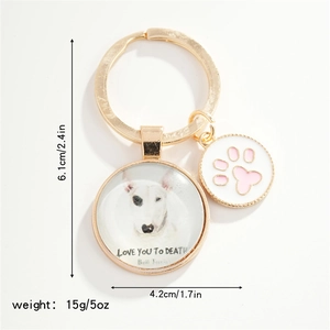 Close-up of Bull Terrier pendant with pink paw print charm showing product dimensions