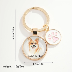 Detailed view of Corgi dog keychain with size dimensions and pink paw pendant