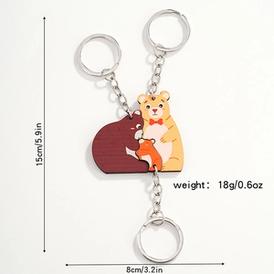 Detail view of cute family bear keychains in three colors with size and weight specs