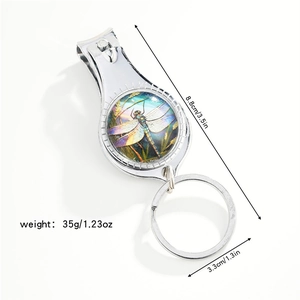 Detail showing dimensions and weight of the dragonfly nail clipper keychain