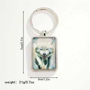Detailed view of silver rectangular pendant with wolf portrait and dimension markers