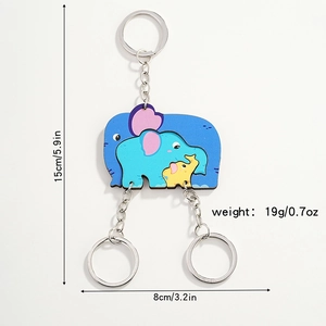 Detail showing cartoon elephant puzzle keychain dimensions of 15cm height and 19g weight