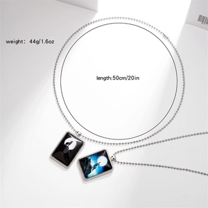 Detail view of dual wolf rectangular pendant necklace with length and weight specifications