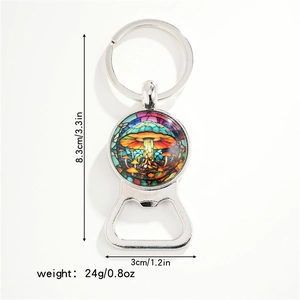 Close-up of silver dragonfly bottle opener keychain showing dimensions 8.3x3cm and weight 24g