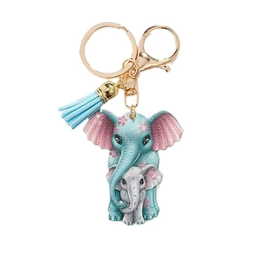 Creative crescent elephant keychain with colorful art print and light blue suede tassel