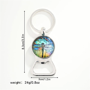 Detail view of dragonfly glass cabochon bottle opener keychain with size and weight specs