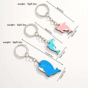 Cute dolphin and whale wooden keychains in pink and blue for parent-child gifts