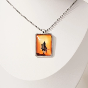 Western cowboy horse rider silhouette pendant necklace with sunset art on bead chain