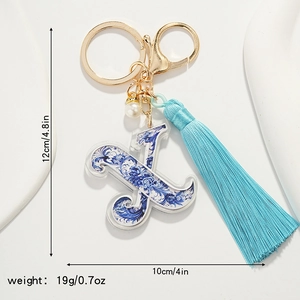 Blue porcelain style letter K keychain dimensions showing 12cm height and 10cm width