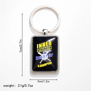 Detail of silver baseball rectangle keychain with motivational print and dimensions