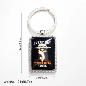 Detail showing volleyball stainless steel keychain dimensions 7x3cm and 21g weight