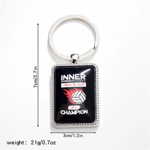 Detailed view of volleyball pendant with motivational text and resin drip sticker
