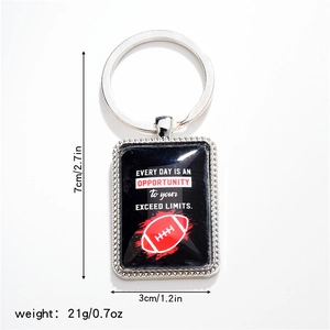 Close-up of a rectangular metal keychain with American football logo and size details