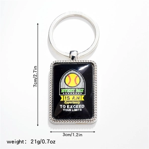 Detail of baseball pendant keychain with inspirational text measuring 7x3 cm and weighing 21g