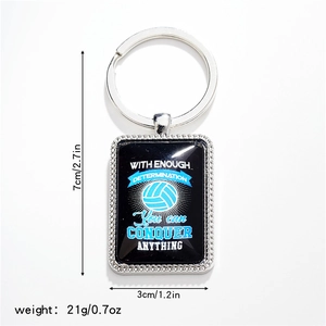 Detail of metal volleyball keychain showing dimensions of 3cm x 7cm and motivational print
