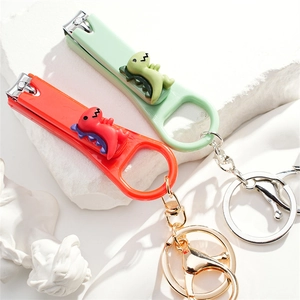 Cute cartoon dinosaur nail clipper keychain set in mint green and bright red finish