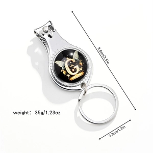 Macro shot showing 3-in-1 tool dimensions: 8.8cm length and 3.3cm keychain ring