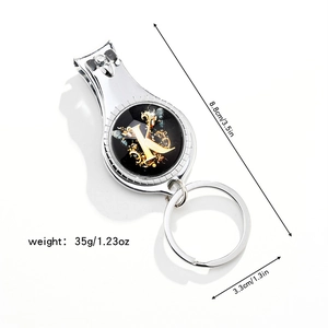 Polished metal 3-in-1 tool with nail clipper, bottle opener, and keychain Letter K design